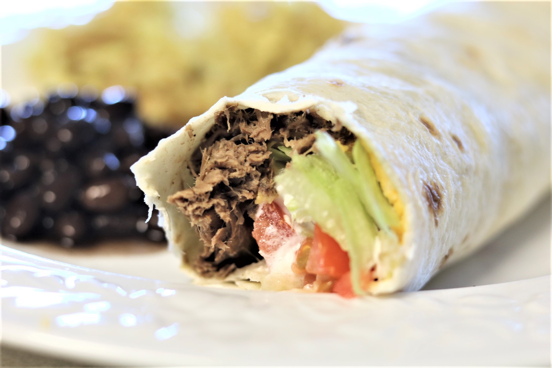 SHREDDED BEEF BURRITOS - that my Mexican brother in law LOVED!